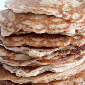 Buckwheat pancakes with syrup and bacon