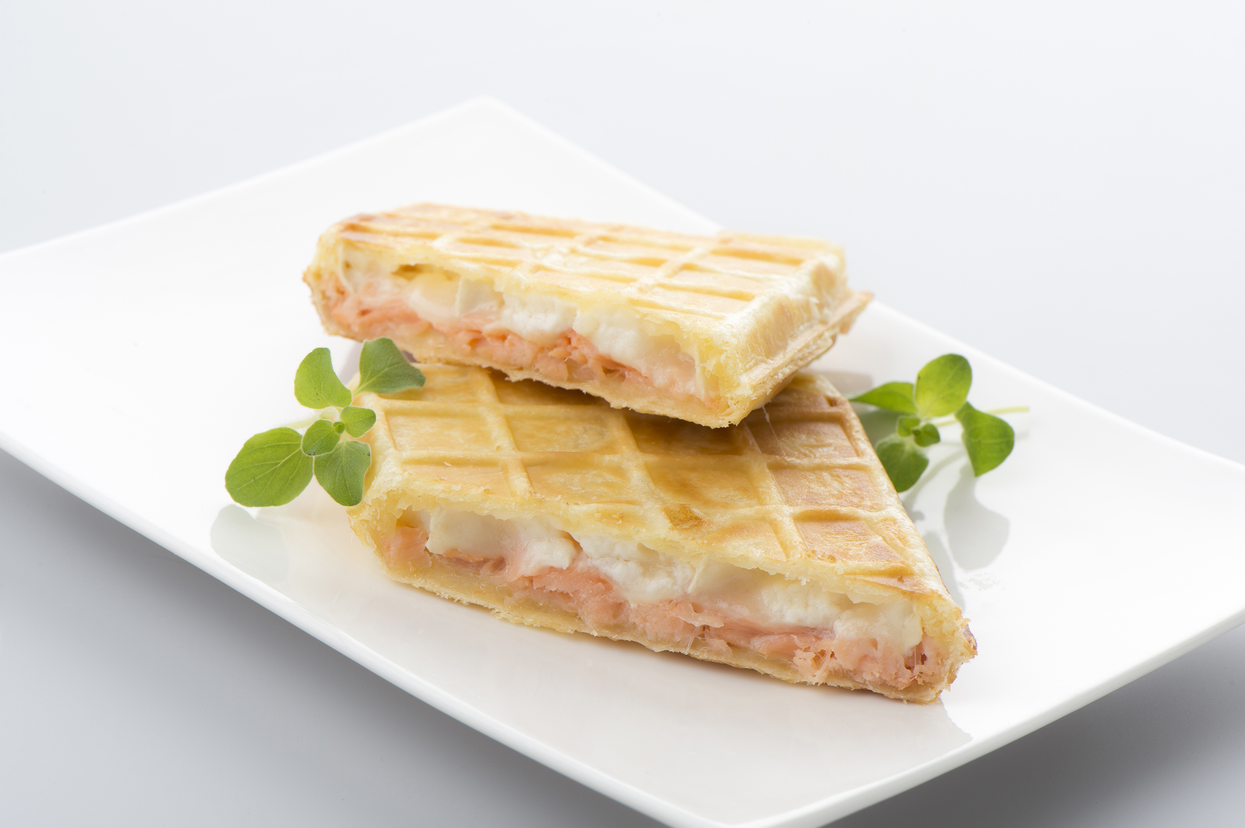 Savory waffle, filled with herb cheese and smoked salmon