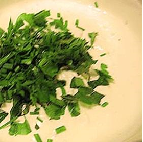Cheese fondue with  herbs